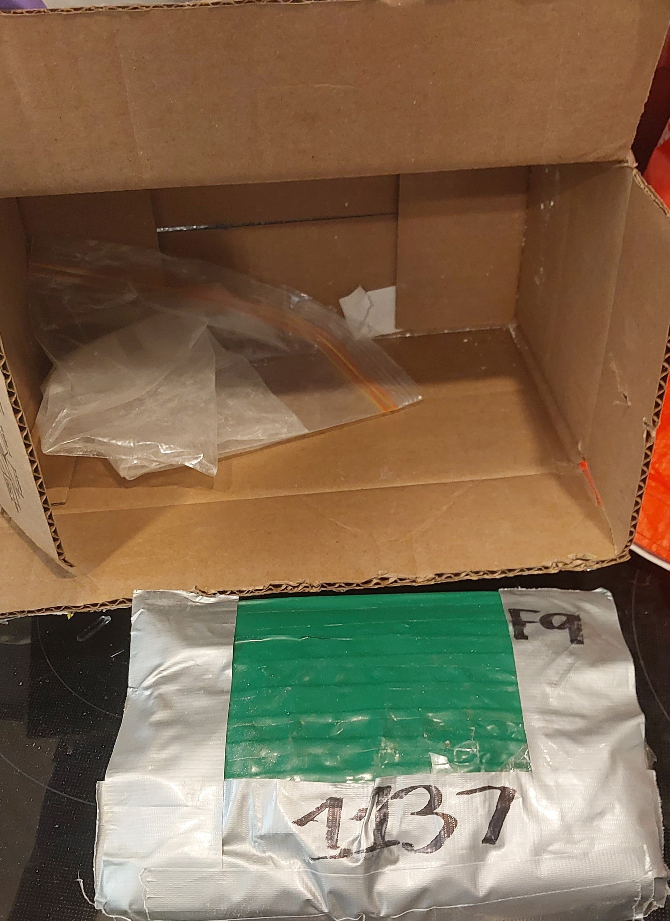 A taped package marked 1137.